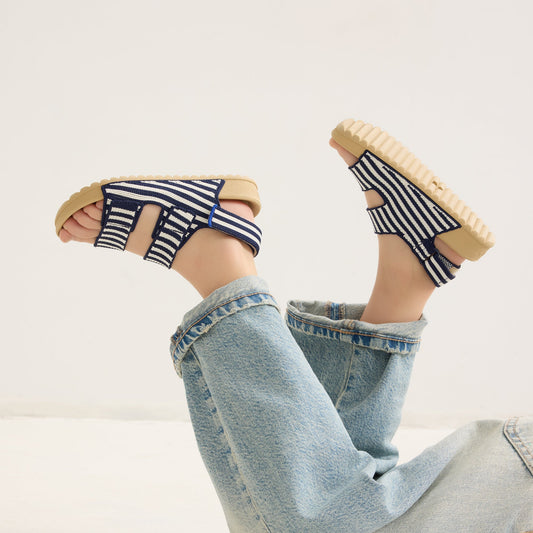 hover | Model wearing The Kids Double Strap Sandal in Sailor Stripes.