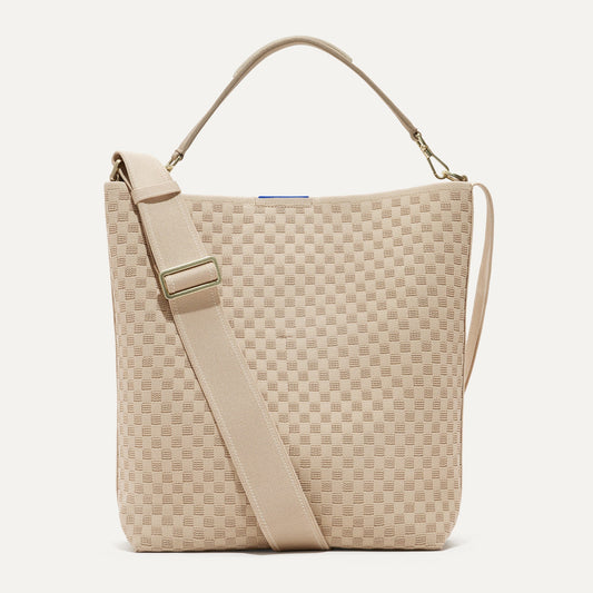 PDP |The Bucket Bag in Knot Brown shown from the front.