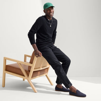 model | Alternate view of a model wearing The Ravello Loafer in Navy.