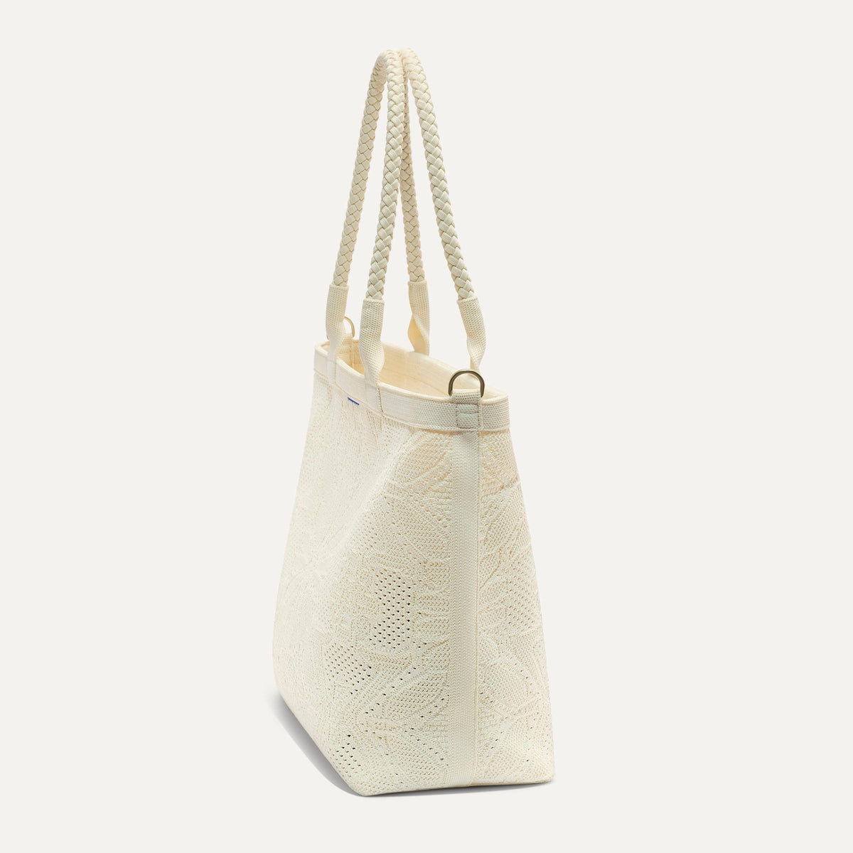The Lightweight Zip Tote in Moonflower shown from the side.