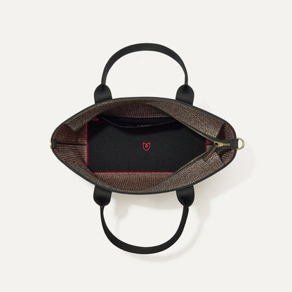The Lightweight Zip Tote in Cacao Herringbone shown from above with the interior exposed.