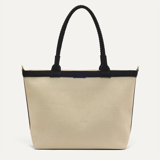 PLP |The Lightweight Zip Tote in Black and White Raffia-Knit shown from the front.