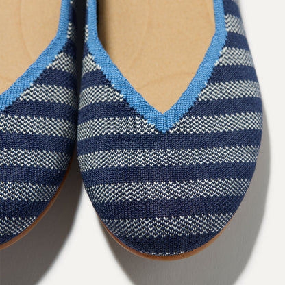 Close up of the toe and vamp of The Daily Flat in Harbor Cabana Stripe.