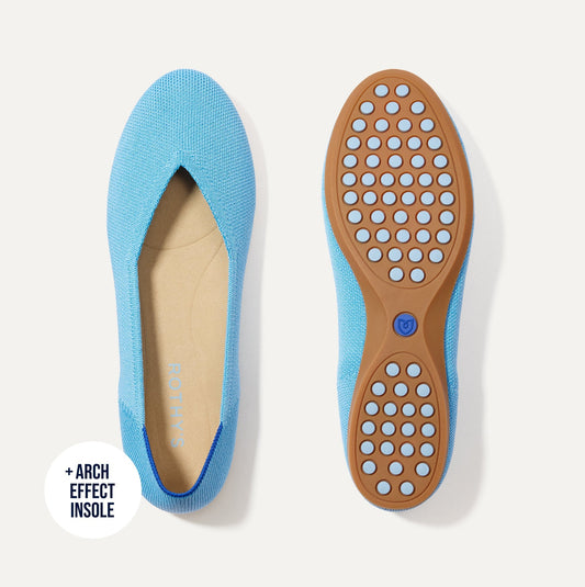 PDP |The Daily Flat in Robin Blue shown from the top with one shoe showing the outsole.