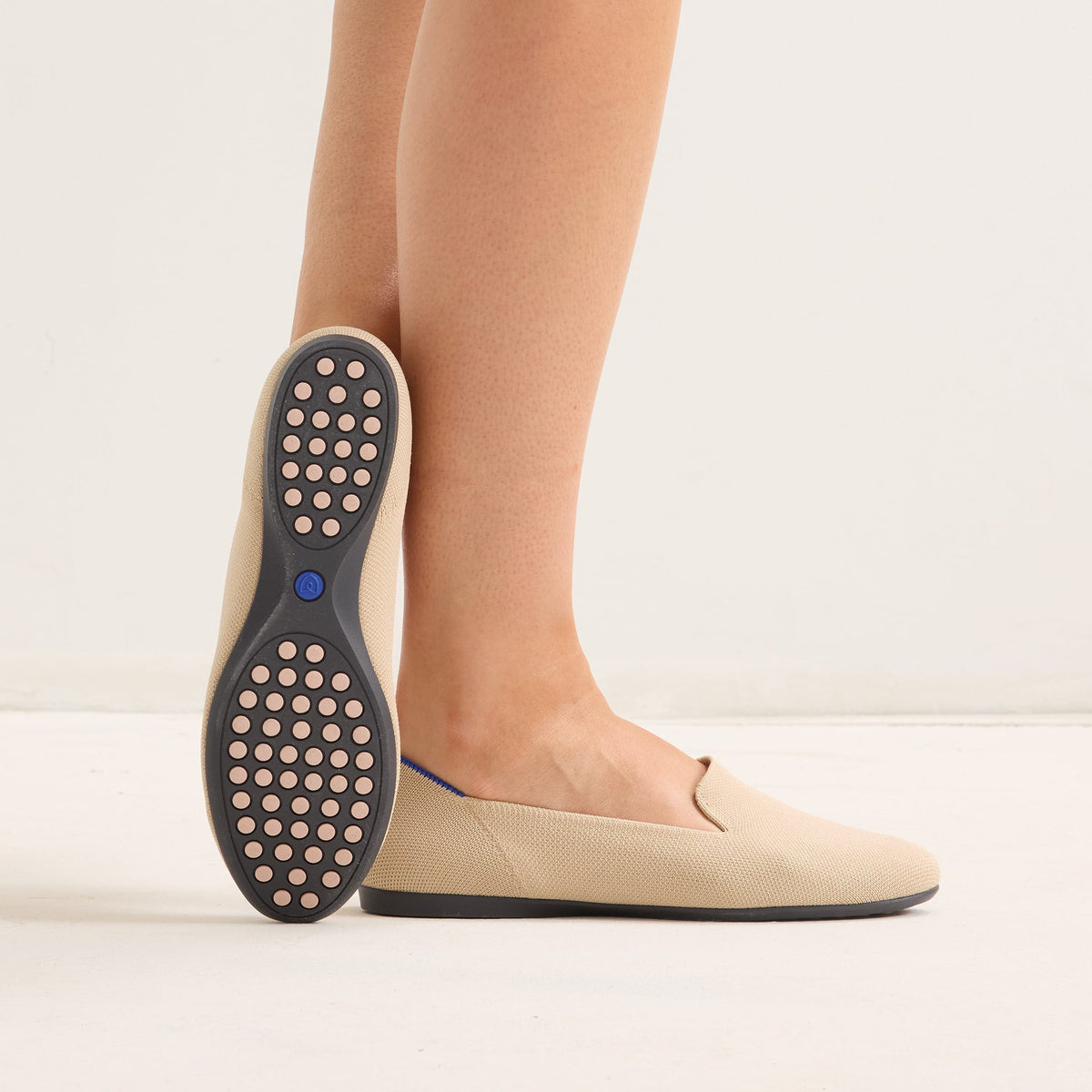 hover | Model wearing The Daily Loafer in Ecru.