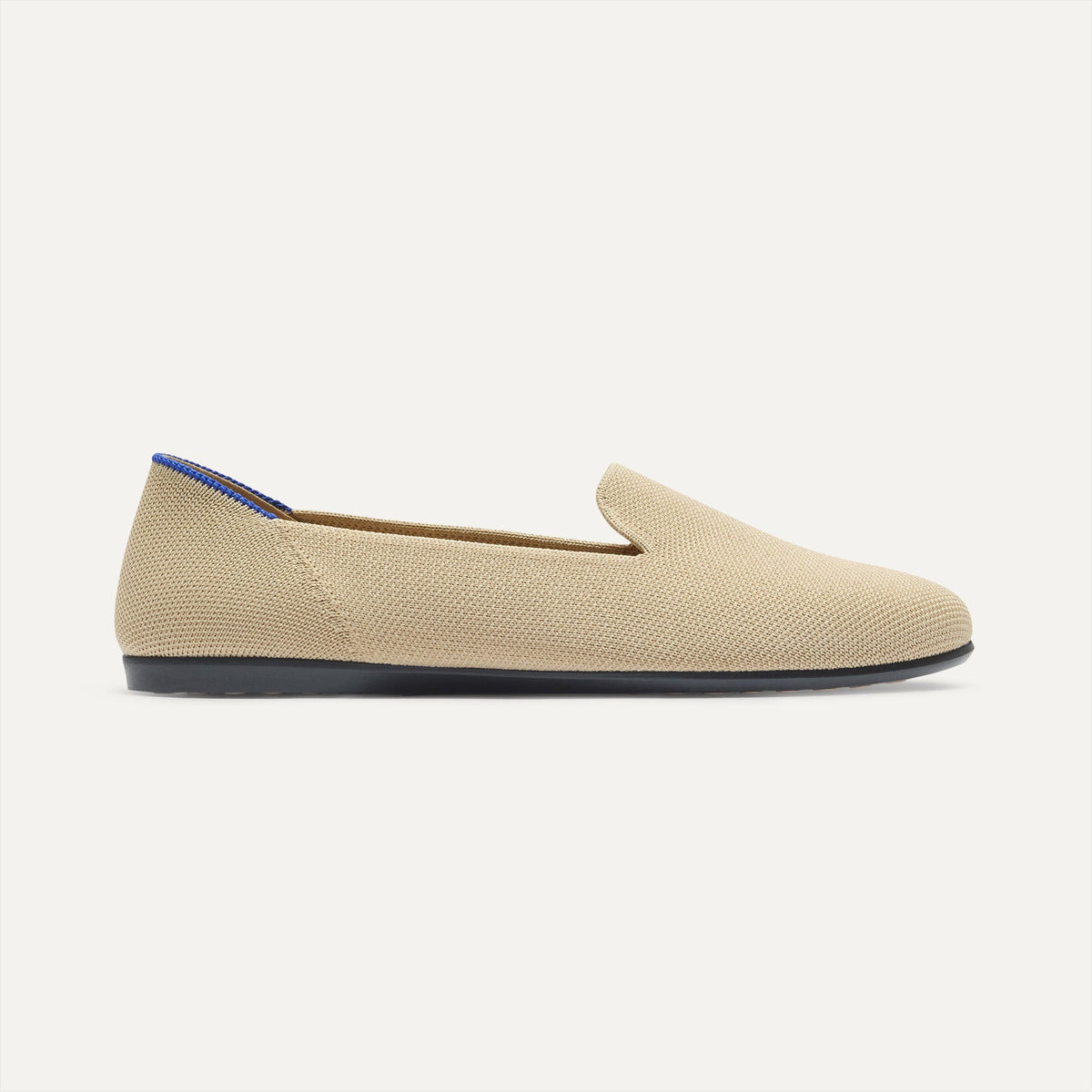 side | The Daily Loafer in Ecru shown from the side.