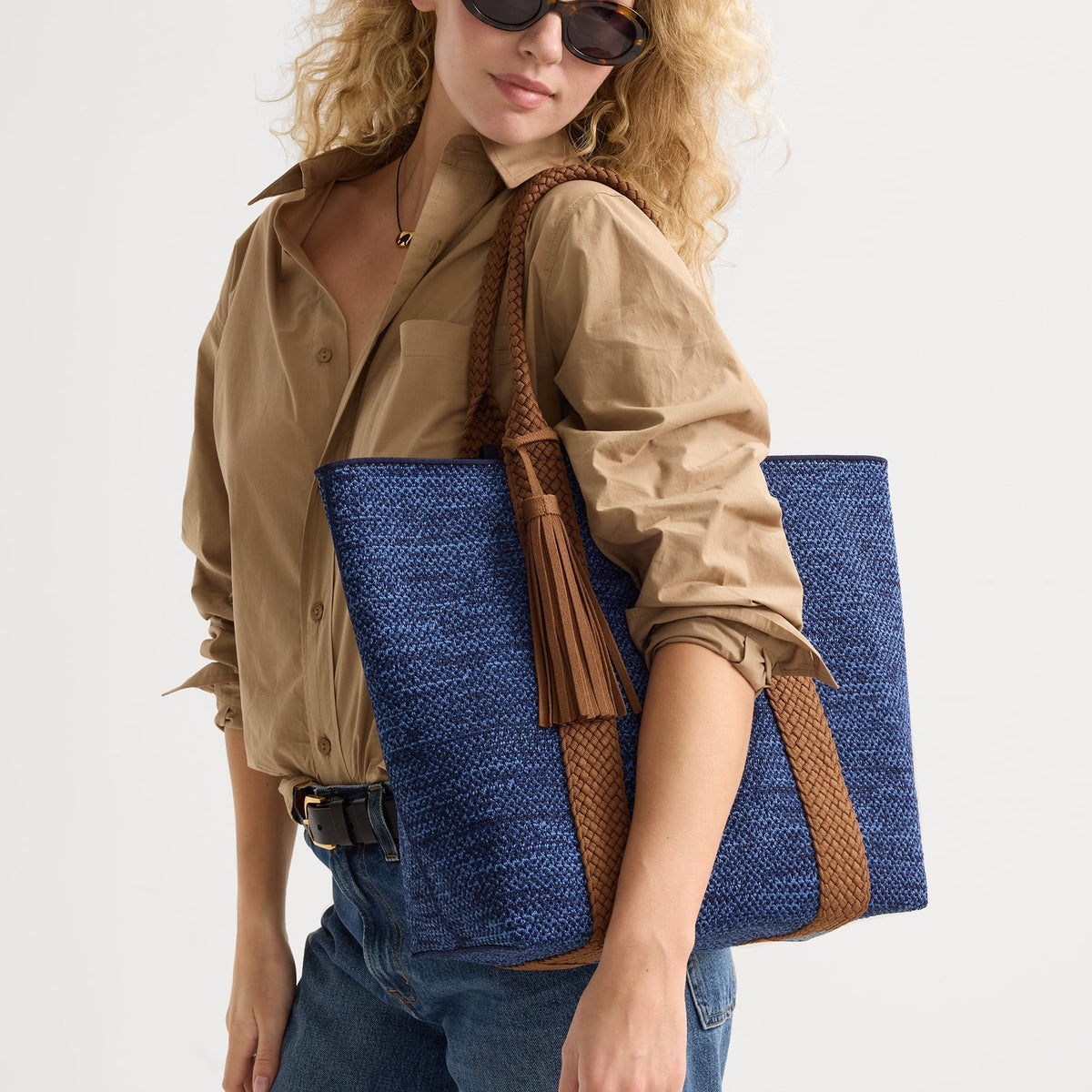 hover |Model carrying The Lightweight Tote in Dusk Open-Knit shown from the front.