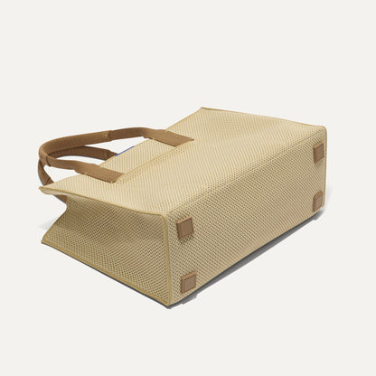 The Classic Tote in Macadamia Open-Knit, shown from the bottom.