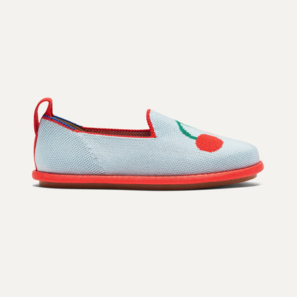 side | The Mini Loafer in Cherry Blue shown from a side view showing the outsole.