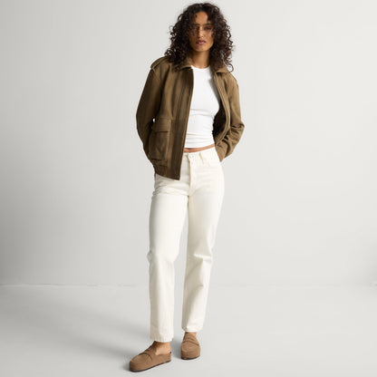 model | An alternate image of a model wearing The Penny Clog in ReVelvet Portobello.